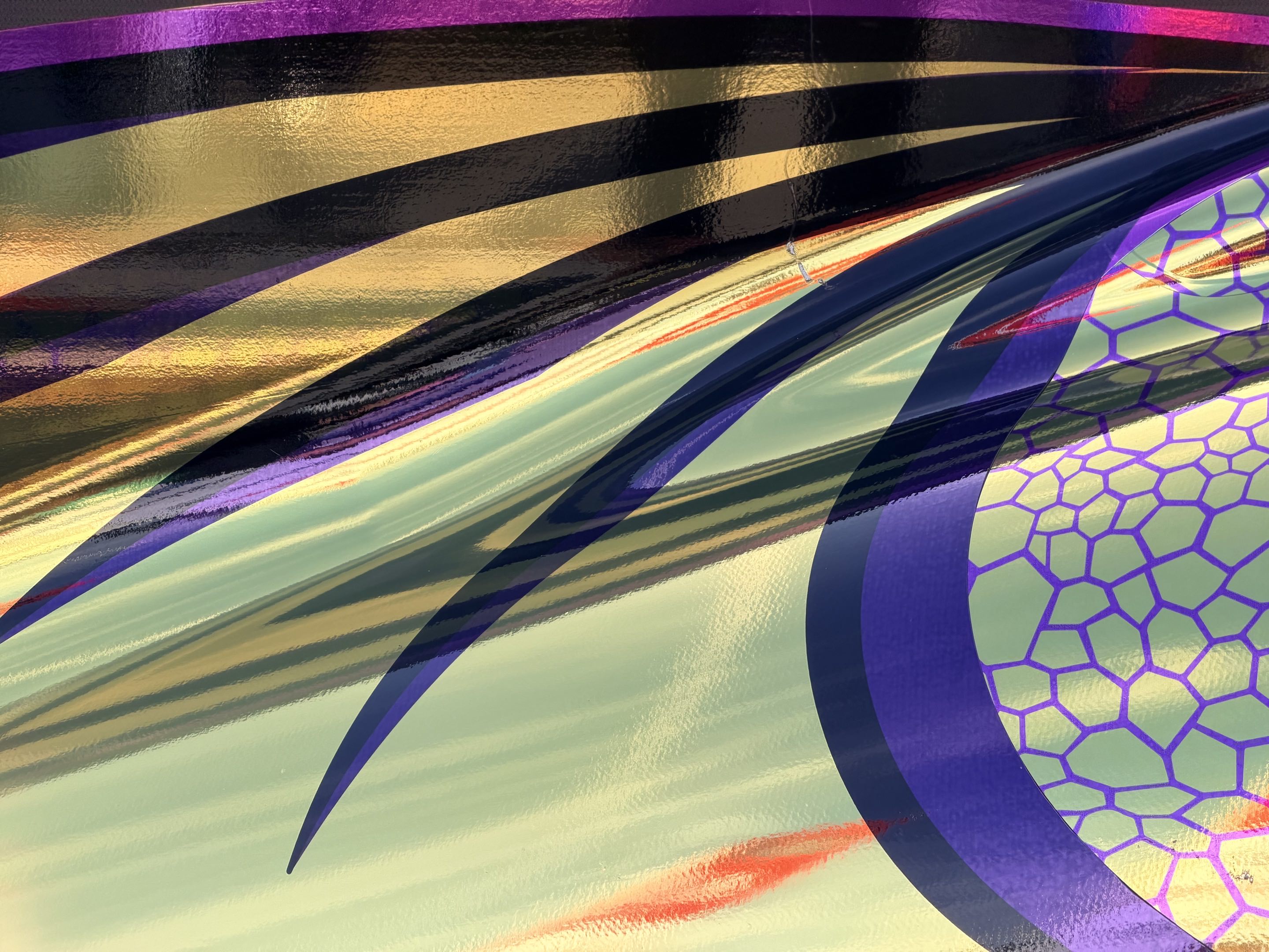 Details of the dragon artwork on the newly gold-plated AO Racing Spike LMP2 car